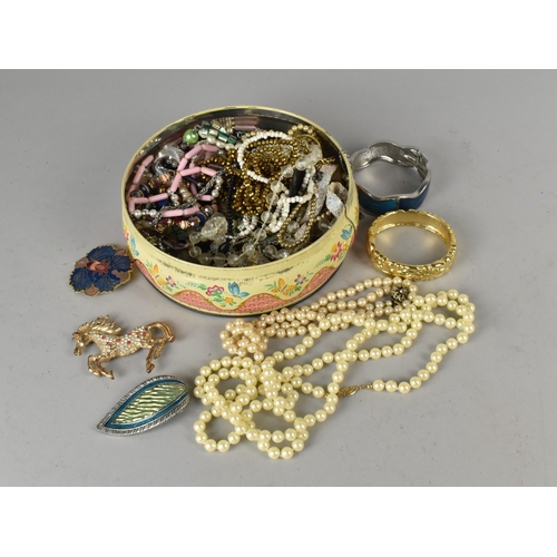 393 - A Collection of Various Costume Jewellery to include Bangles, Faux Pearl Necklaces, Brooches Etc