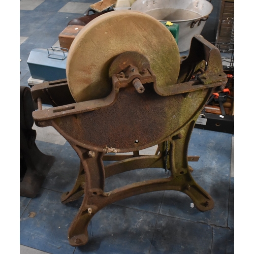 414 - A Vintage Cast Iron Grindstone, 63cms Wide