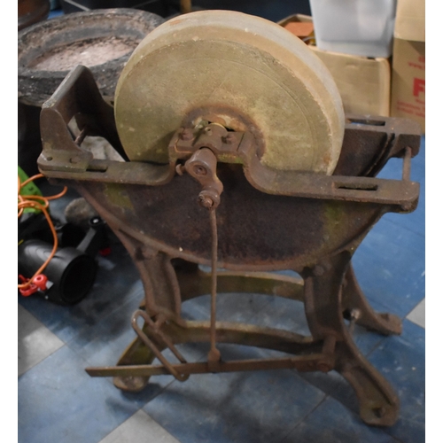 414 - A Vintage Cast Iron Grindstone, 63cms Wide