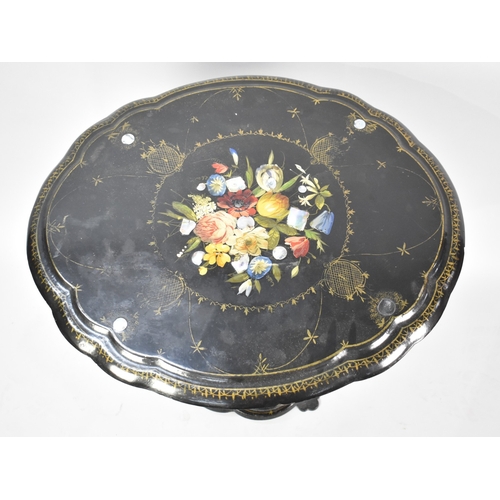 78 - A Victorian Painted and Mother of Pearl Inlaid Papier Mache Oval Snap Top Table with Turned Support ... 