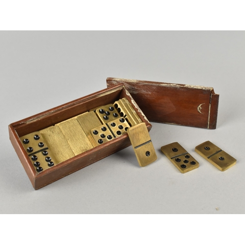 21 - A Small Far Eastern Teak Box Containing Miniature Brass Six Spot Dominoes, 9cms Wide