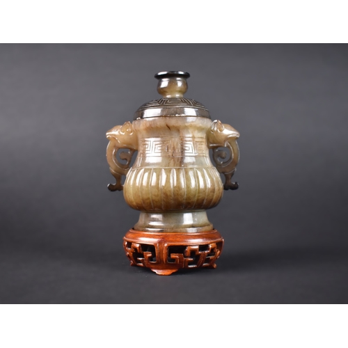 39 - A Reproduction Chinese Carved Hardstone Lidded Censer with Two Carved and Pierced Handles on Turned ... 