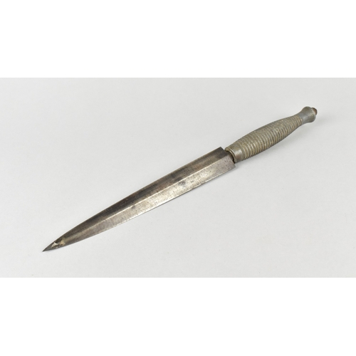 A WWII Period Commando Dagger with Double Edged Blade and Ribbed Handle