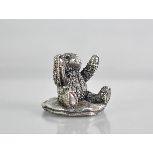 13 - Miniature Sterling Silver Teddy Bear on Cushion, 3cm High.