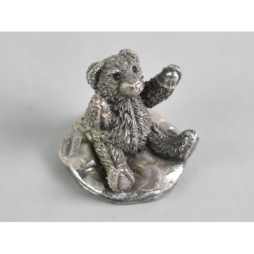 13 - Miniature Sterling Silver Teddy Bear on Cushion, 3cm High.