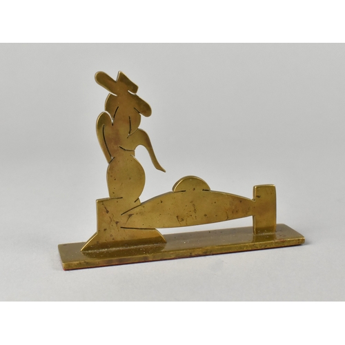 30 - An Art Deco Signed Brass Cut Fret Desk Ornament In The Form Of What Appears To Be a  Lady with Fedor... 