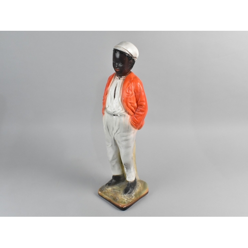 35 - A Cold Painted Plaster Figure. 49cm High (This Item is Listed on the Basis that it is Illustrative o... 