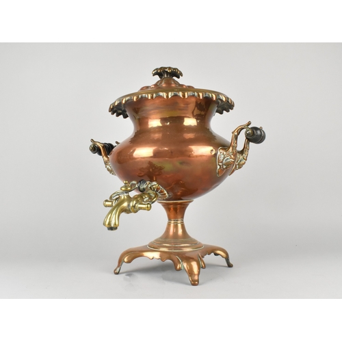 36 - A Victorian Copper Samovar with Two Carrying Handles and Brass Tap, 38cms High