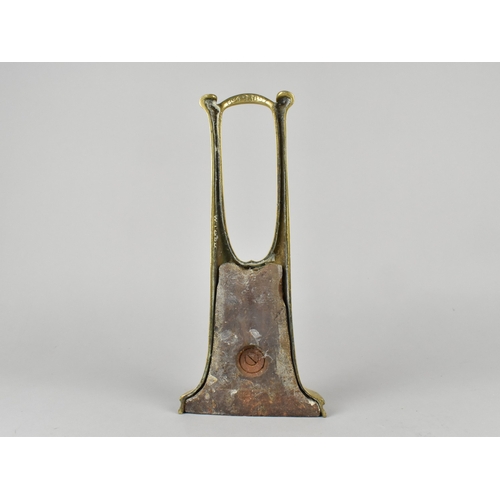 4 - An Art Nouveau Brass Door Porter with Weighted Base, Registration Number 493897, 30cm High.
