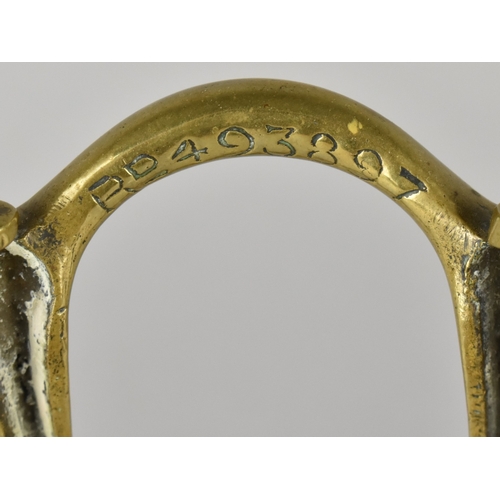 4 - An Art Nouveau Brass Door Porter with Weighted Base, Registration Number 493897, 30cm High.