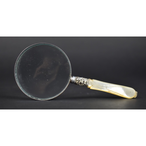 40 - A Small Mother of Pearl Handled Magnifying Glass with Silver Banding, 14.5cms Long