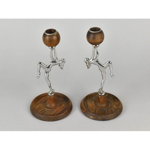 52 - A Pair of Art Deco Chrome and Wooden Candlesticks, the Supports In The Form of Nudes with Knees Rais... 
