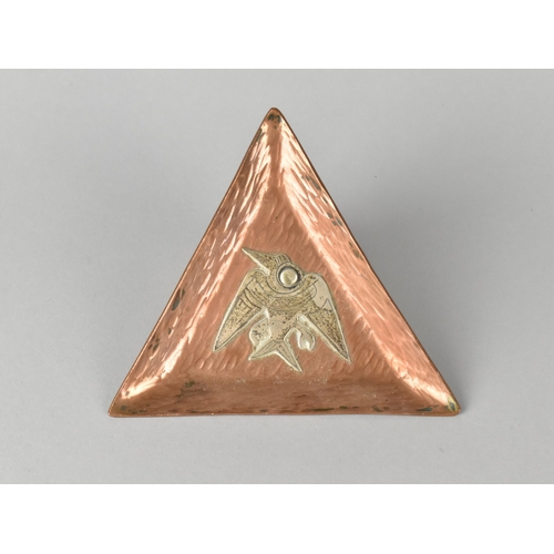 8 - A Peruvian Triangular Copper and Silver Triangle Dish with Pelican Bird Motif, 12.5cm diameter.