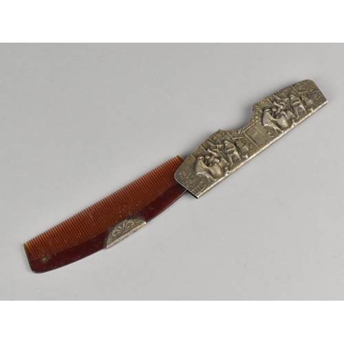 39 - A Continental Pressed Pewter Comb in Sleeve Decorated in Relief with Tavern Scenes