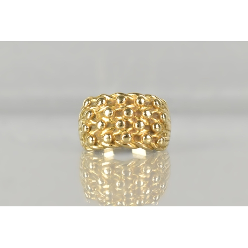 39 - A 9ct Gold Keeper Ring, 5.5gms, Size I.5, Hallmarked for JM Co, Other Marks Obscured