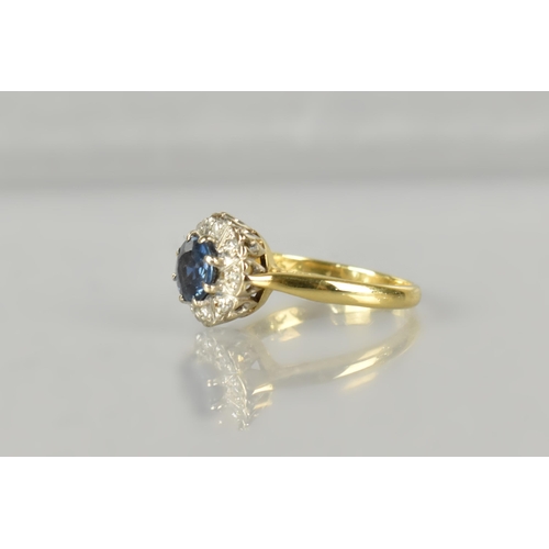 9 - An 18ct Gold, Diamond and Blue Zircon Type Cluster Ring, Central Round Cut Stone 6.4mm Diameter, Sup... 