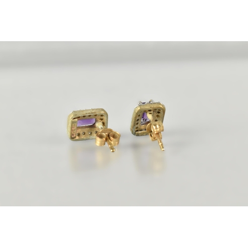 11 - A Pair of Diamond and Amethyst Earrings, Emerald Cut Amethyst Measuring 5.1mm by 3.1mm and Supported... 