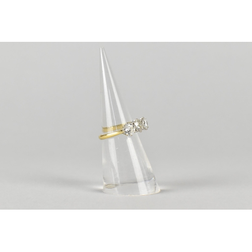 5 - A Three Stone Diamond Ring, Central Round Cut Stone Measuring 5.39mm Diameter, Side Diamonds 5.18mm ... 