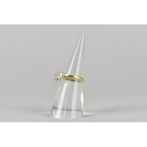 5 - A Three Stone Diamond Ring, Central Round Cut Stone Measuring 5.39mm Diameter, Side Diamonds 5.18mm ... 