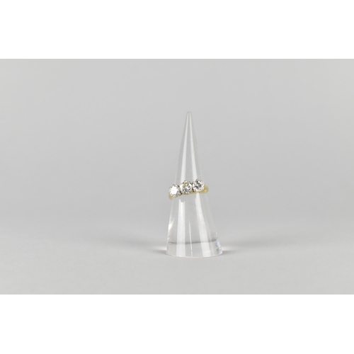 5 - A Three Stone Diamond Ring, Central Round Cut Stone Measuring 5.39mm Diameter, Side Diamonds 5.18mm ... 