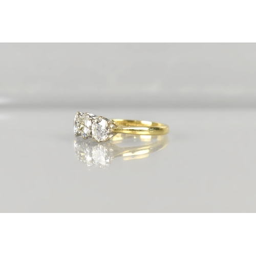 5 - A Three Stone Diamond Ring, Central Round Cut Stone Measuring 5.39mm Diameter, Side Diamonds 5.18mm ... 