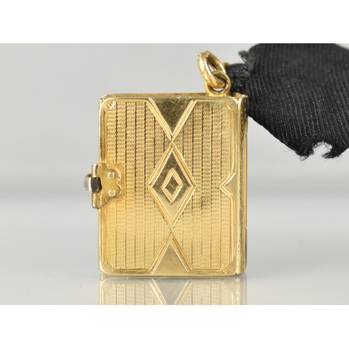 12 - A Rare Victorian Six Panel Locket in the Form of a Folding Tooled Leather Bound Book Containing Vari... 