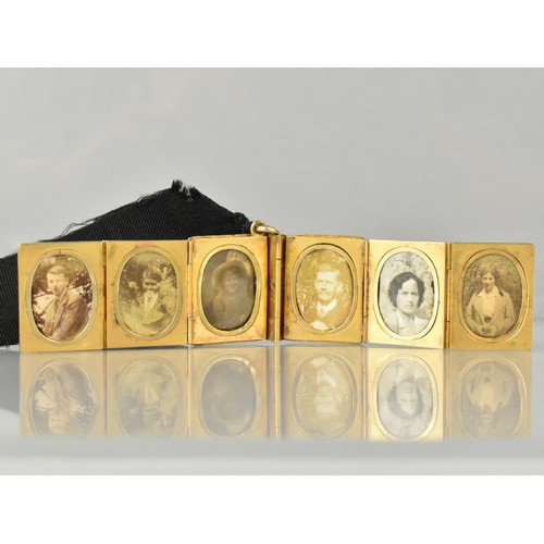 12 - A Rare Victorian Six Panel Locket in the Form of a Folding Tooled Leather Bound Book Containing Vari... 