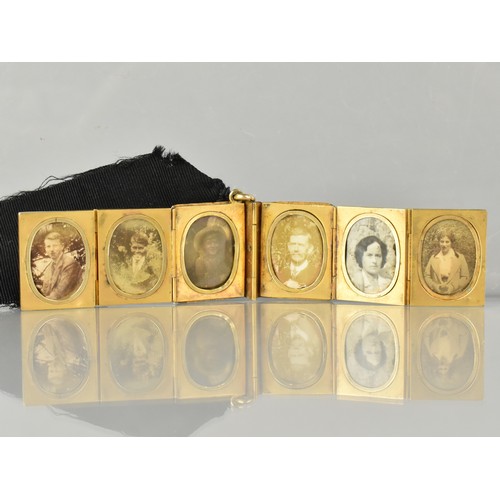 12 - A Rare Victorian Six Panel Locket in the Form of a Folding Tooled Leather Bound Book Containing Vari... 