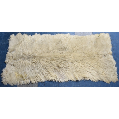 A Sheepskin Rug, 170cm x 80cm