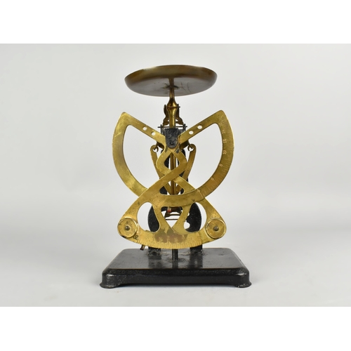 57 - An Edwardian Columbus Bilateral Scale, 20.5cm high