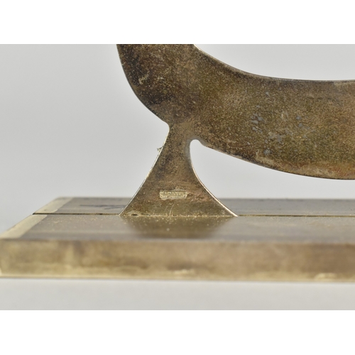 10 - An Italian Lino Sabattini Polished Steel Fretwork Sculpture 'Bassotto', (Dachshund), 15.5cms High