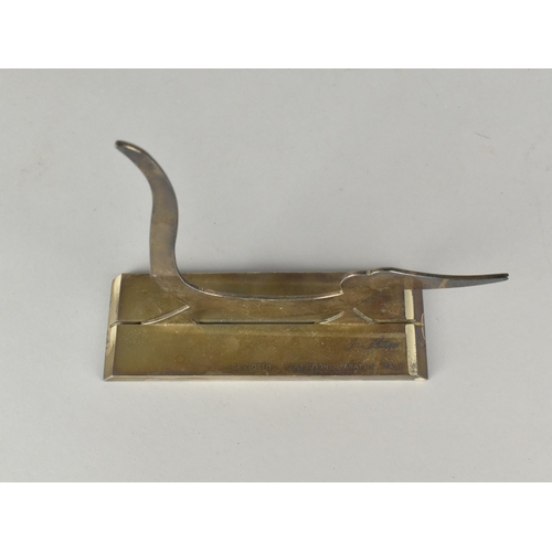 10 - An Italian Lino Sabattini Polished Steel Fretwork Sculpture 'Bassotto', (Dachshund), 15.5cms High