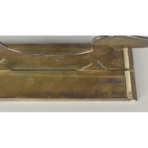 10 - An Italian Lino Sabattini Polished Steel Fretwork Sculpture 'Bassotto', (Dachshund), 15.5cms High