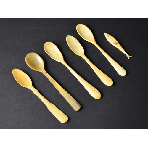 22 - A Collection of Bone and Horn Teaspoons together with a Fish Gaming Counter