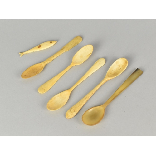 22 - A Collection of Bone and Horn Teaspoons together with a Fish Gaming Counter