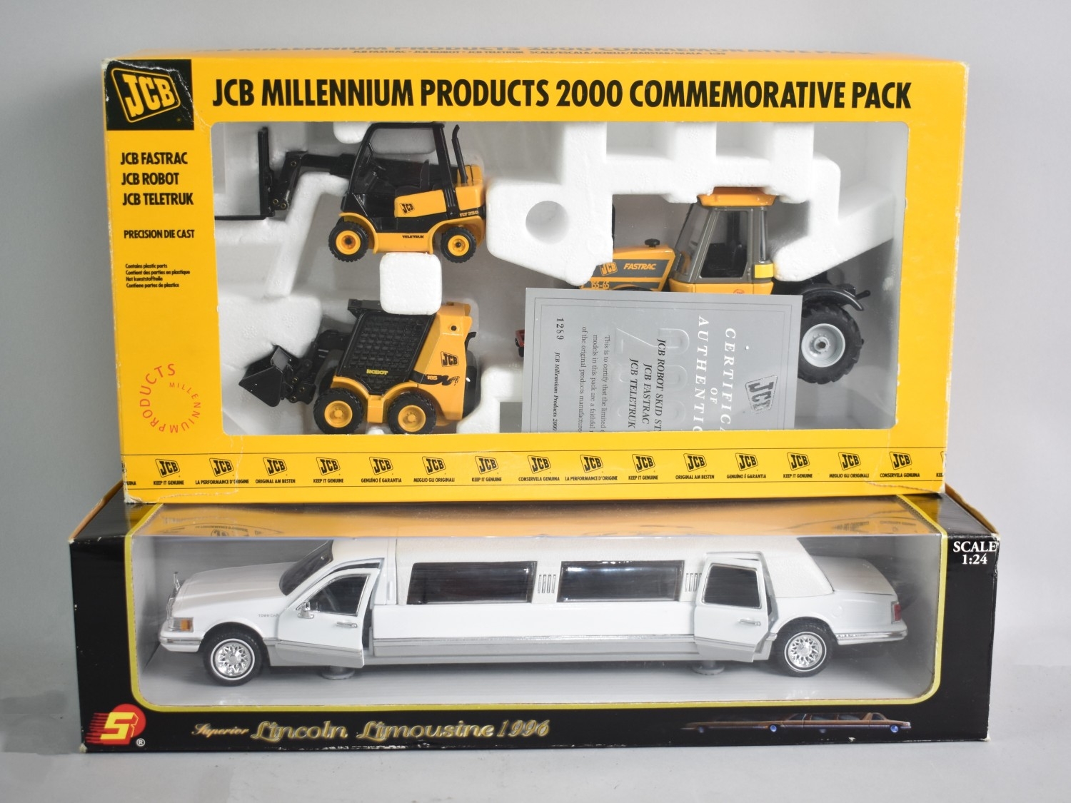 A Boxed JCB Millennium Diecast Set Comprising Fastrak, Robot and ...