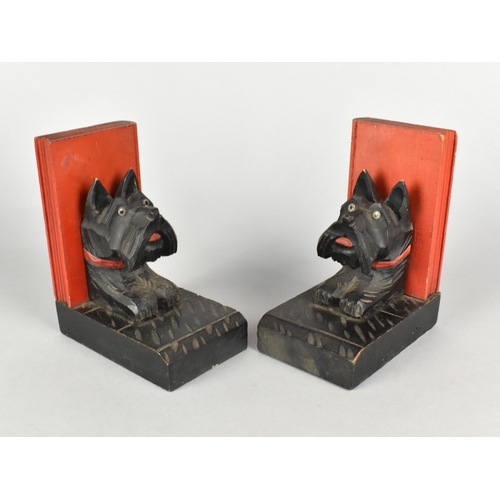 27 - A Pair of Early/Mid 20th Century Carved and Painted Wooden Bookends with Scotty Dog and Book Mounts,... 