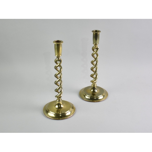 38 - A Pair of Open Spiral Brass Candlesticks, 31cms High