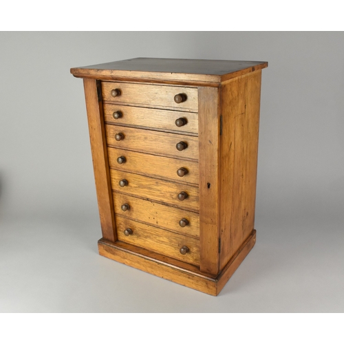 39 - An Edwardian Oak Seven Drawer Collectors Chest, Some Loss of Veneer to Left Side, 38cms Wide by 26cm... 