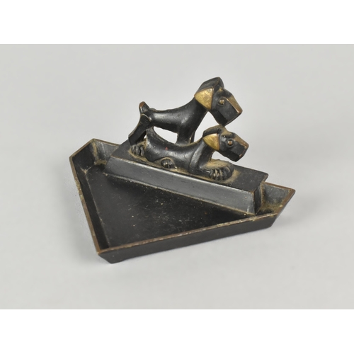4 - An Art Deco Triangular Bronze Ashtray, Probably German, Decorated with Two Terriers, 9.5cms Wide