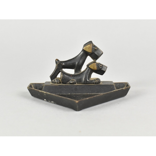 4 - An Art Deco Triangular Bronze Ashtray, Probably German, Decorated with Two Terriers, 9.5cms Wide