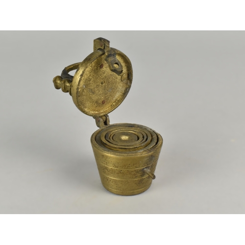 41 - A Set of Vintage Graduated Brass Weights, 7cms High