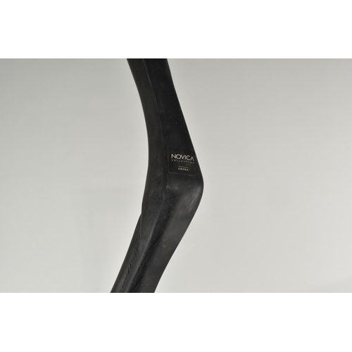 203 - A Carved and Ebonised African Souvenir Walking Stick