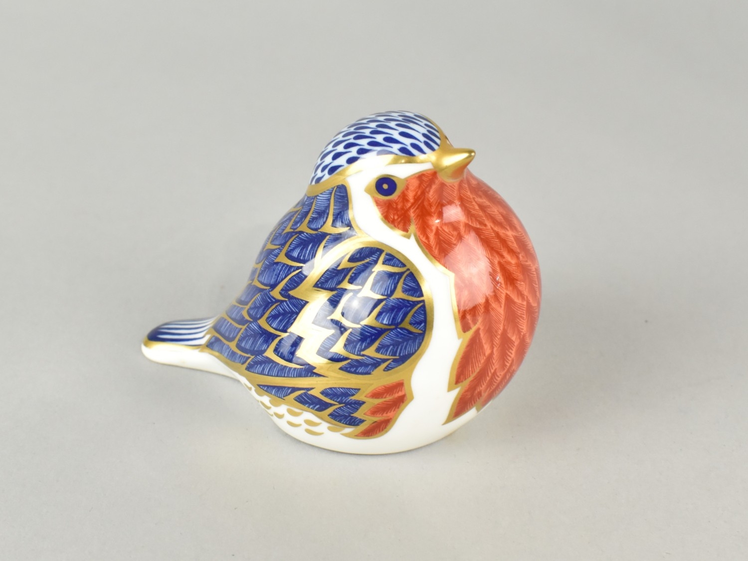 A Royal Crown Derby Paperweight, Robbin, with Button