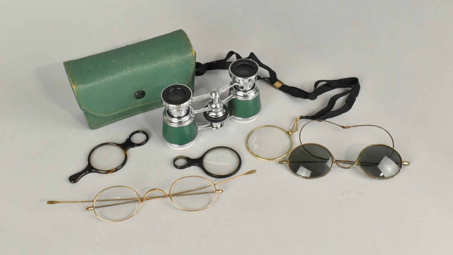 A Collection of Various Early 20th Century Monocles and Spectacles ...