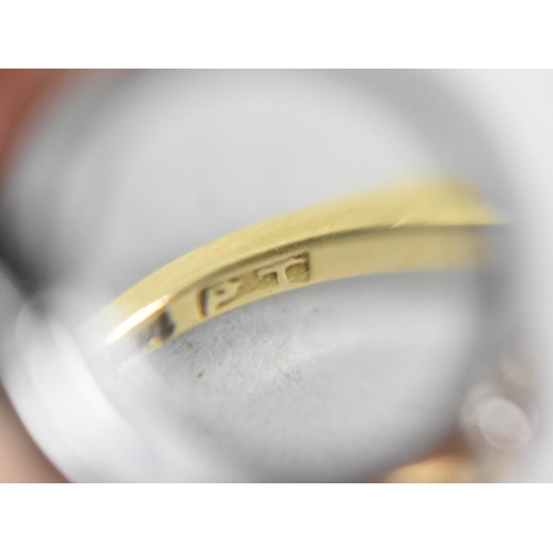 24 - An 18ct Gold, Platinum, Ruby and Diamond Daisy Ring, Old European Cut Ruby Measuring 3.1mm by 3.5mm ... 