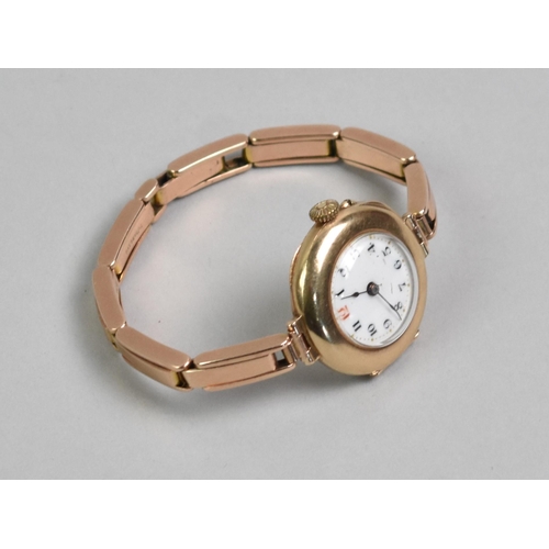 26 - An Early 20th Century Swiss Made Dreadnought 9ct Gold Trench Style Wristwatch and Strap, White Ename... 