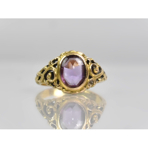 25 - An 14ct Gold and Amethyst Dress Ring, Oval Low Cabochon Stone, (Verso Faceted), Measuring 8.9x6.8mm.... 