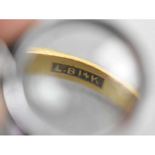 25 - An 14ct Gold and Amethyst Dress Ring, Oval Low Cabochon Stone, (Verso Faceted), Measuring 8.9x6.8mm.... 