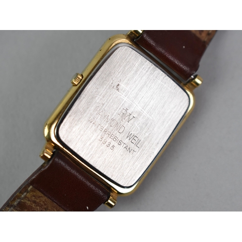 46 - A Boxed Raymond Weil Wristwatch, Textured White Face with Gilt Hour Indicators and Hands, Date Apert... 